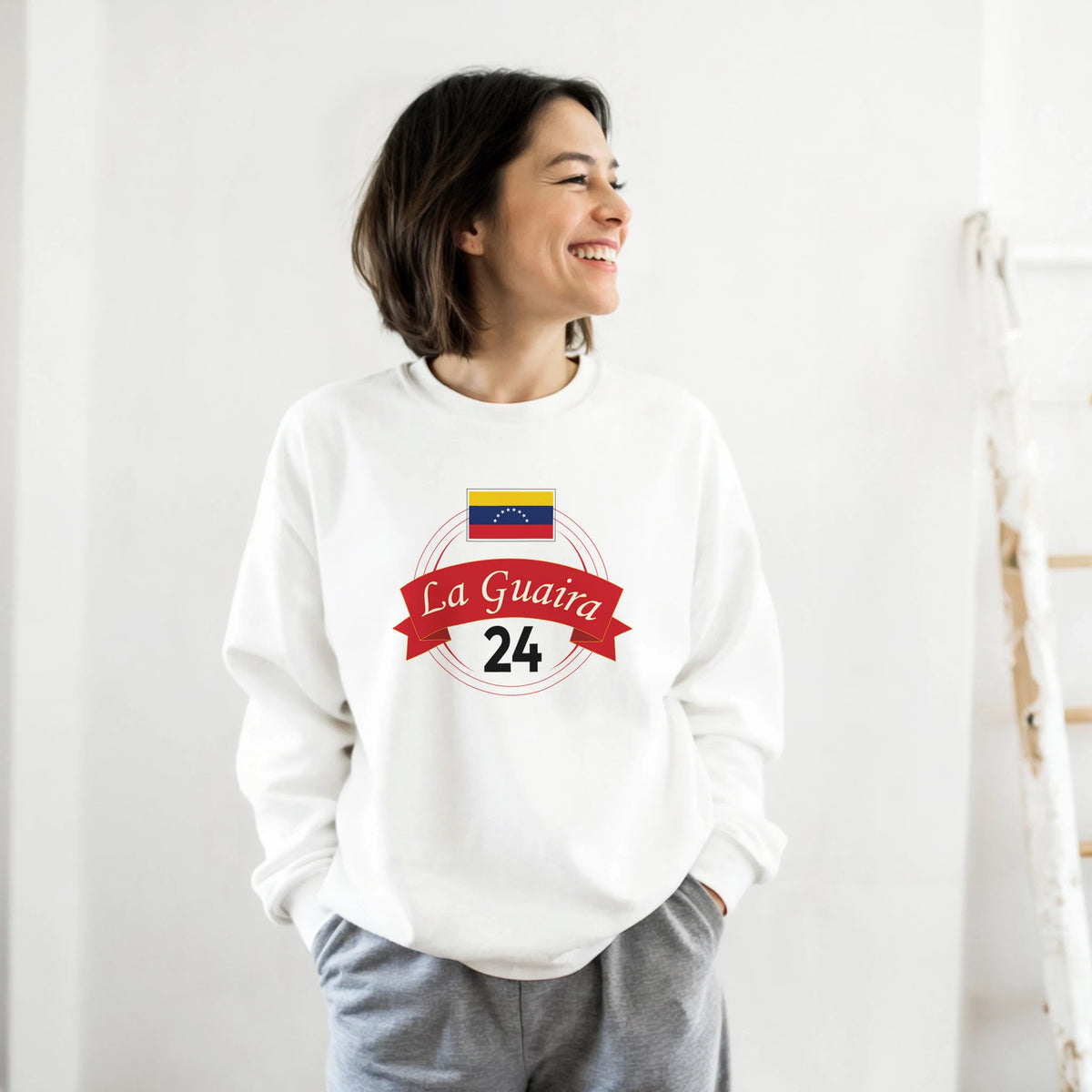 White sweatshirt with La Guaira 24 and flag graphic